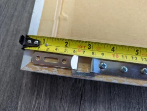 How To hang a picture using Strap Hangers.